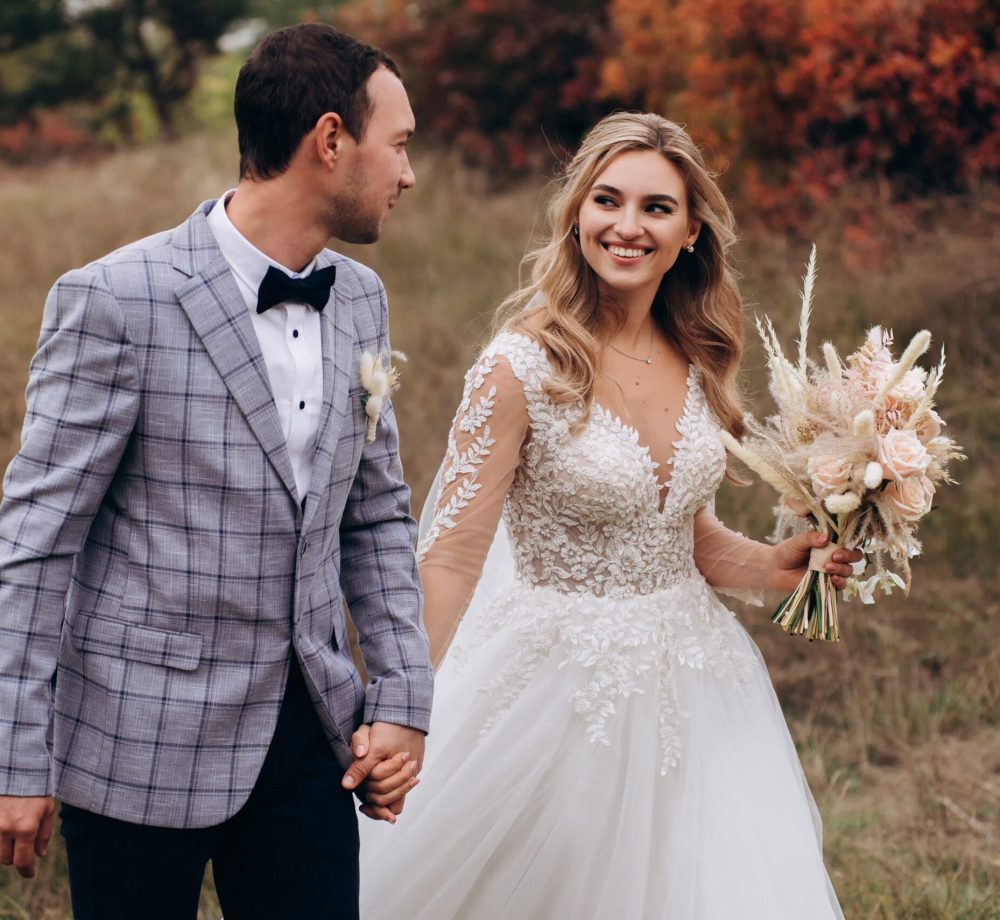 Wedding,Couple,With,Bouquet,With,Roses,And,Spikelets,.boho,Style